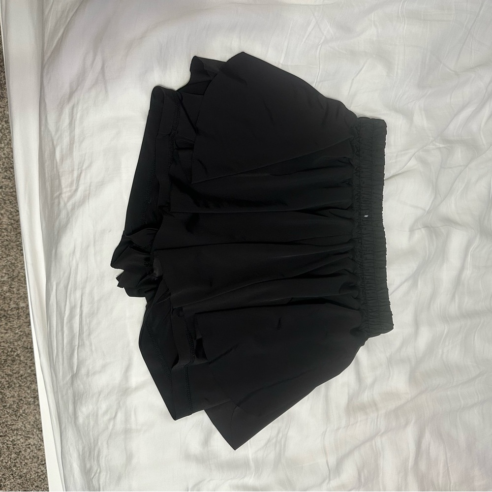 Black flowy athletic shorts
